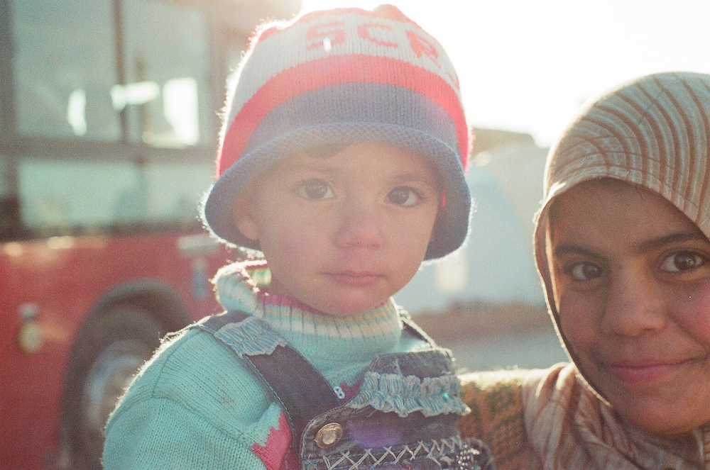 Refugees in the makeshift camp of Bab Al Salameh on the Syrian border with Turkey. F100 Portra 800