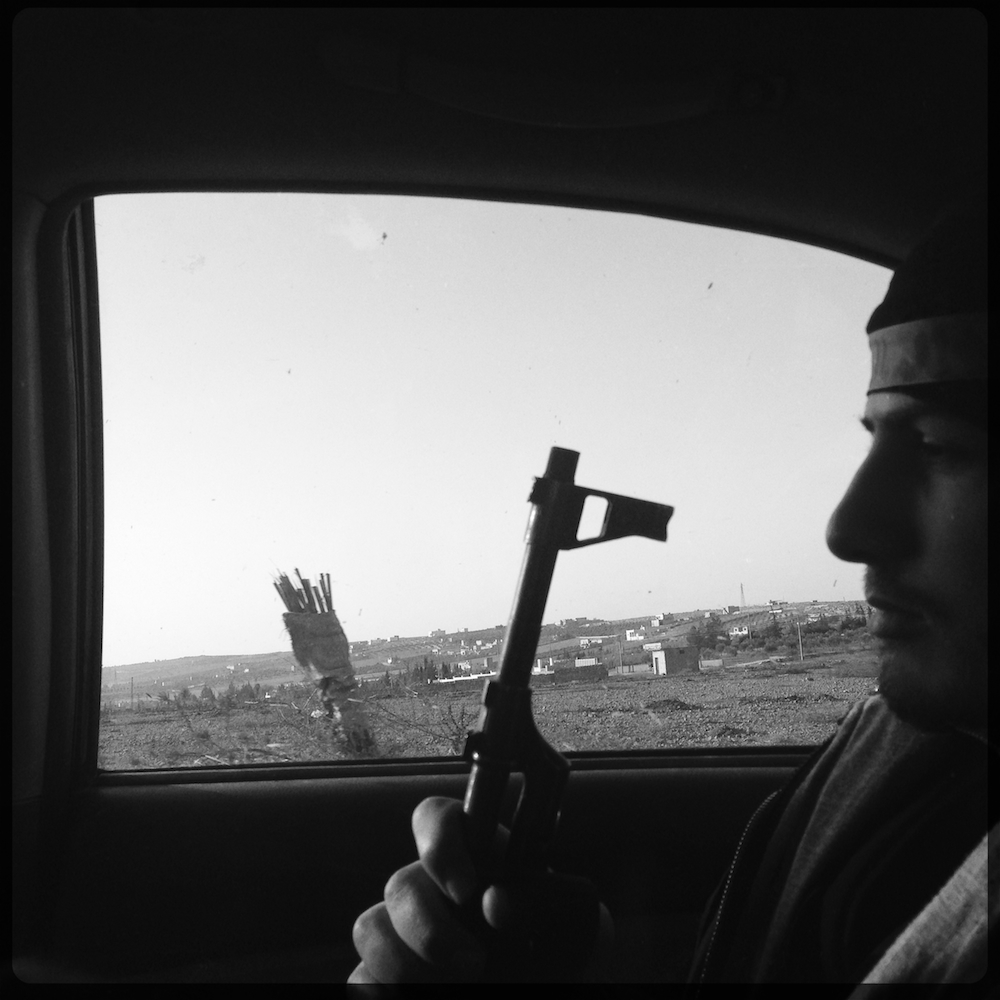 Doctor, 19, on the drive into Aleppo. iPhone Hipstamatic App