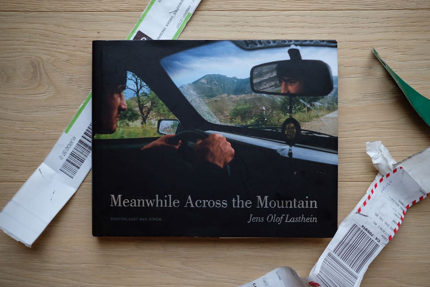 Jesse’s Book Review – “Meanwhile Across the Mountain” by Jens Olof Lasthein
